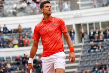 Novak Djokovic wasn't happy after Cameron Norrie hit the back of Serbian's leg with a smash in feisty Italian Open match | CNN