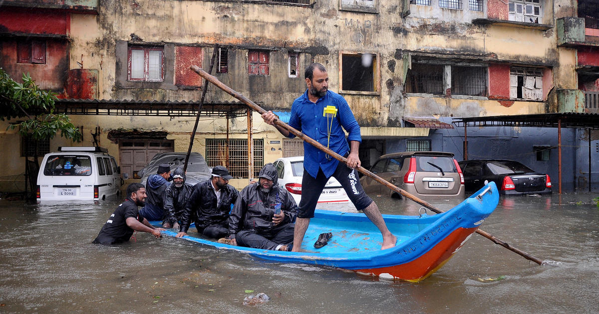 Cyclone Michaung flooding inundates Chennai airport in India as cars are swept down streets