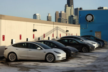 Tesla Profit Doubles From Tax Effect, but Price Cuts Hurt