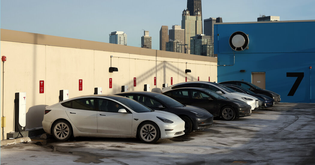 Tesla Profit Doubles From Tax Effect, but Price Cuts Hurt