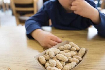 How can parents protect their children from peanut allergies?